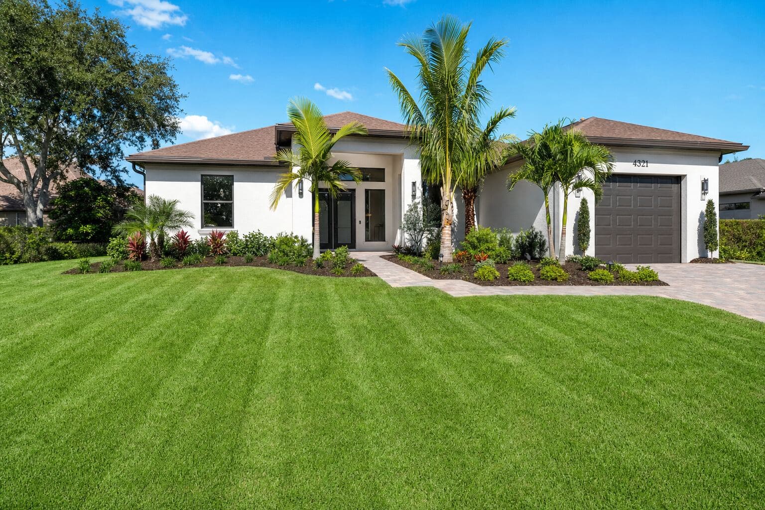 Freshly installed sod and manicured lawn landscaping